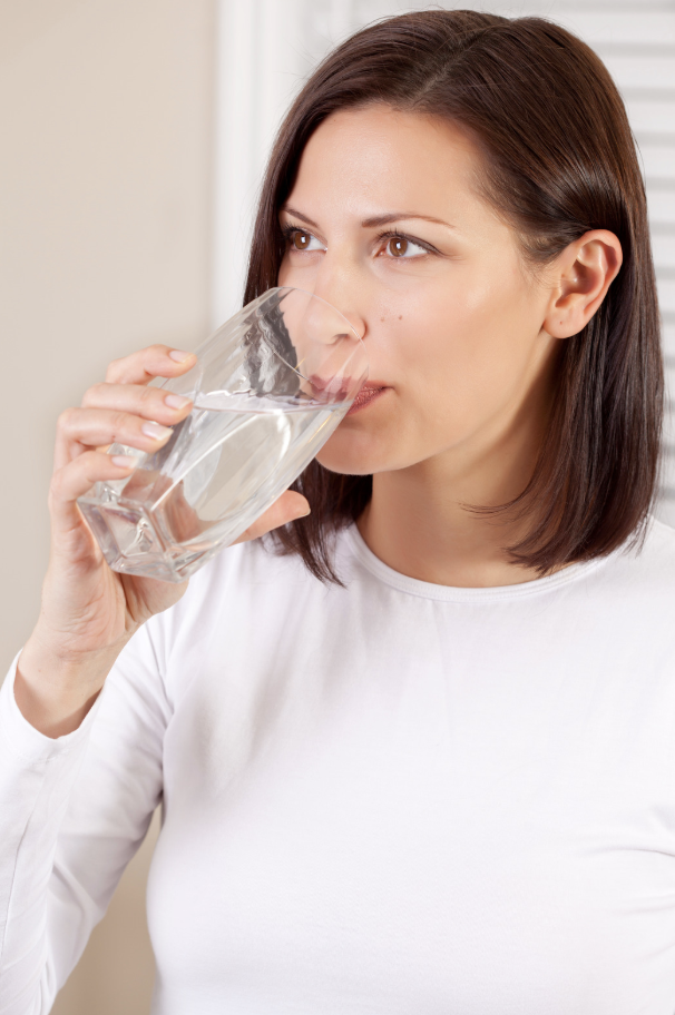 woman drinking glass of water